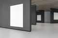 Gray gallery interior with mock up posters Royalty Free Stock Photo