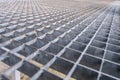 Gray galvanized iron grate, perspective view. Metal Flooring Royalty Free Stock Photo