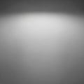 A gray gradient background with a spotlight effect focused at the center. The gradient Royalty Free Stock Photo
