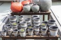 Gray, grained clay flower pots, shop window for gardening and growing potted plants and flowers. Capacity for flowers,flowerpot