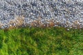 Gray gravel and green grass pattern Royalty Free Stock Photo