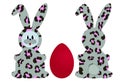 Gray hare with leopard pink spots in front and back and red egg