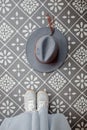 Gray hat on a patterned background
