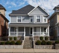 Gray House in Urban Neighborhood