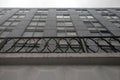 Gray industrial building with a fence. Greyness dull grey buildings in Moscow. Plain old build of the Soviet era Royalty Free Stock Photo