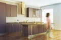Gray kitchen corner, purple countertops blur