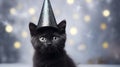 Cat in a shiny cap. Kitten celebrates New Year or Christmas