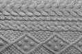 Gray knit pattern with Irish cables and rhombs