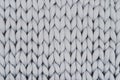 Gray knitted blanket from merino wool Royalty Free Stock Photo