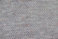 Gray knitted fabric texture. Rough sweater background Royalty Free Stock Photo