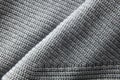 Gray knitted jumper material texture Royalty Free Stock Photo
