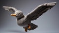 Gray Knitted Seagull Toy - Playful Patterns In Maya