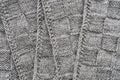 Gray knitted wool pattern texture background. Handmade Knitwear. Royalty Free Stock Photo