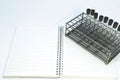 Gray laboratory tube with stainless rack on the white background.