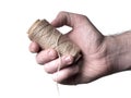 A gray leather thread is in a man`s hand. Gray thread and hand isolated