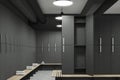 Gray locker room with open door