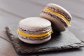 Gray macaroons on dark grey background Royalty Free Stock Photo