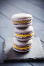 Gray macaroons on dark grey background Royalty Free Stock Photo