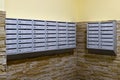 Gray mailboxes in corridor of the apartment building Royalty Free Stock Photo