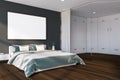 Gray master bedroom corner with horizontal poster Royalty Free Stock Photo