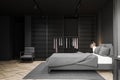 Gray master bedroom interior with wardrobe