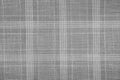 Gray material texture checkered light gray textured fabric background close-up