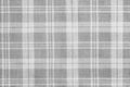 Gray material texture checkered light gray textured fabric background close-up