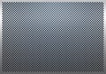 Gray metal background, perforated metal texture Royalty Free Stock Photo