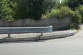 Gray metal barrier on the street Royalty Free Stock Photo