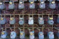 Clustered gas electric meters against brick building