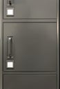 Gray metal cabinet with handles and label slots. Office storage. Royalty Free Stock Photo