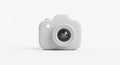 Gray miniature camera model with a simple, smooth design and a prominent lens Royalty Free Stock Photo