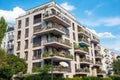 Gray modern multi-family house with balconies