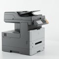 Gray multi-function printer with a paper feeder on top and a control panel on the side.