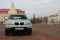 Chernigov, Ukraine - November, 2017. Gray off-road car BMW X5. A private car parked on the sidewalk.