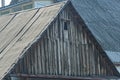 Gray old wooden attic of a rural house with a small window Royalty Free Stock Photo