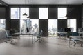 Gray open space office with checkered windows, side view Royalty Free Stock Photo