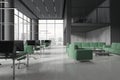 Gray open space office interior with lounge area Royalty Free Stock Photo