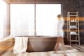 Gray panoramic bathroom, tub close up, woman