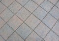 Gray patio pavers with maroon detail Royalty Free Stock Photo