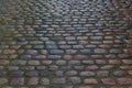 Gray pattern of granite medieval paved road. Background texture