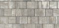 Gray paving stones. Paving surface road. Texture made of big gray cement bricks Royalty Free Stock Photo