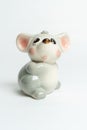 Gray piggy bank toy made of porcelain glass mouse Royalty Free Stock Photo