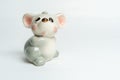 Gray piggy bank toy made of porcelain glass mouse Royalty Free Stock Photo