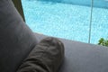 grey pillow put on bed, pool view Royalty Free Stock Photo