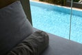 grey pillow put on bed, pool view Royalty Free Stock Photo