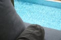 grey pillow put on bed, pool view Royalty Free Stock Photo