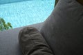 grey pillow put on bed, pool view Royalty Free Stock Photo