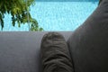 grey pillow put on bed, pool view Royalty Free Stock Photo