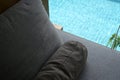 gray pillow put on bed, pool view Royalty Free Stock Photo
